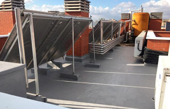 Impermeabilización en Segovia 12 Cubierta plana impermeabilizada con sistema líquido y paneles solares en Segovia